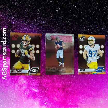 a group of three football cards on a purple background