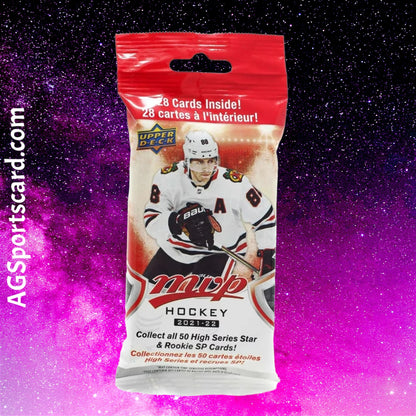 a bag of hockey cards on a purple background